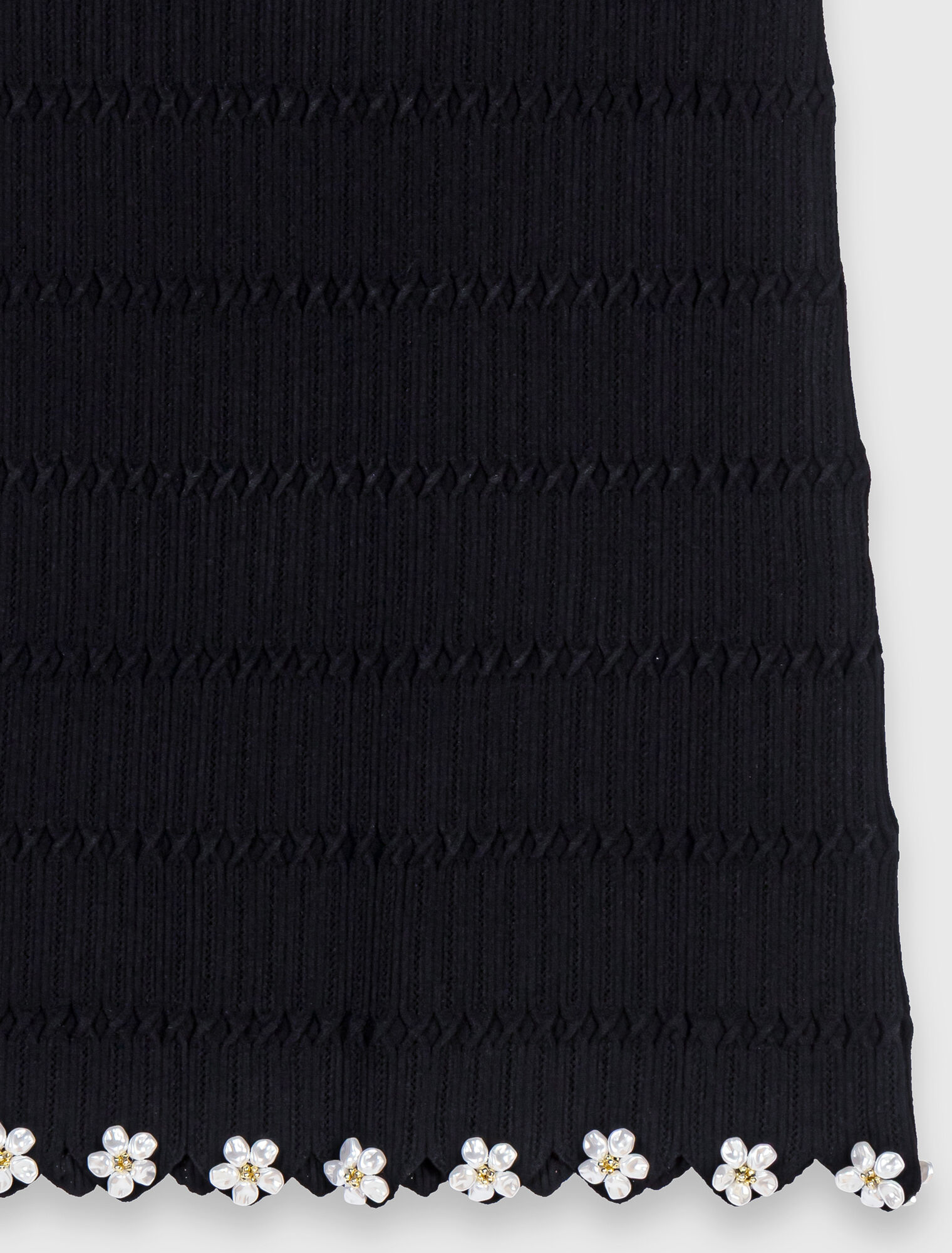 Knit skirt with jewelled flowers