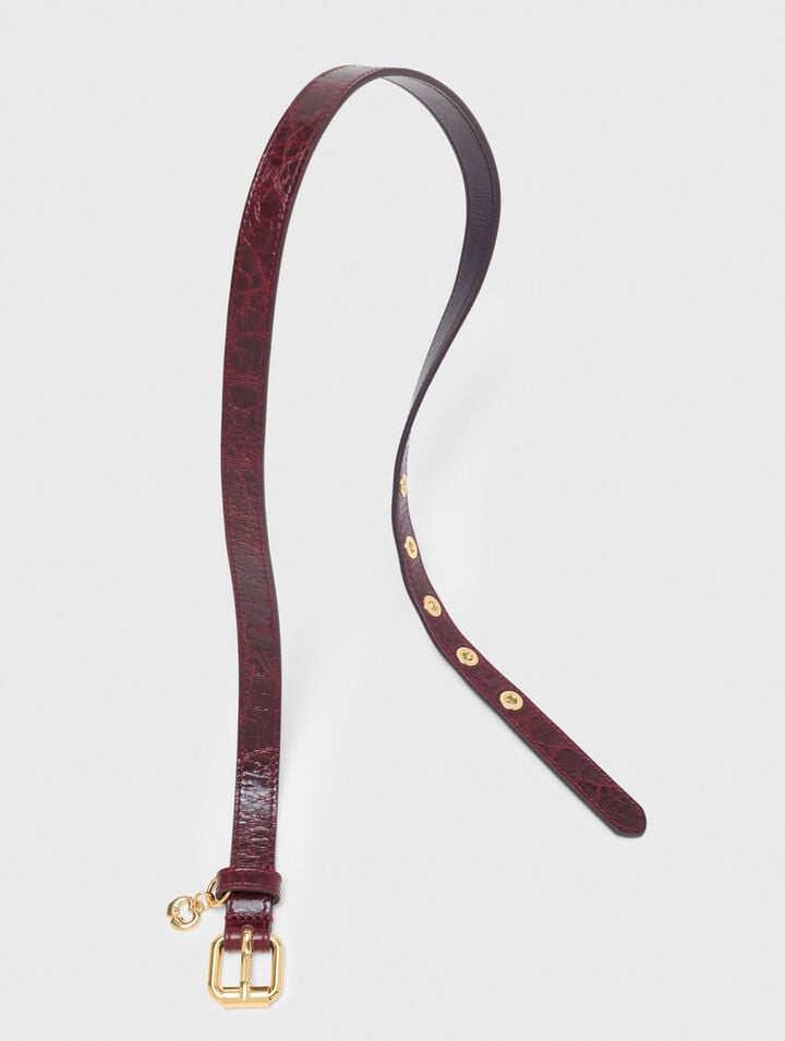 Slim leather belt with eyelets