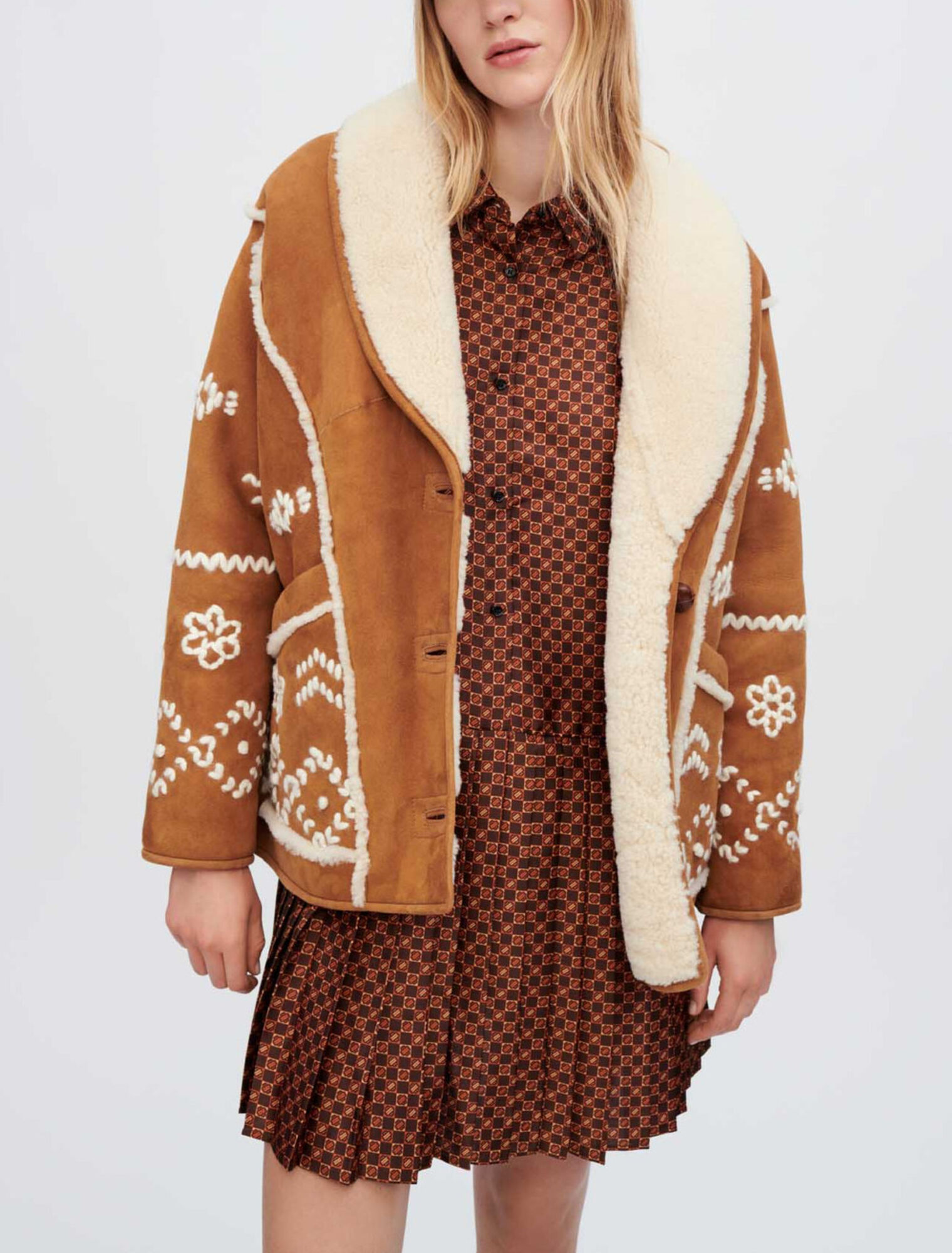 Fully embroidered shearling coat