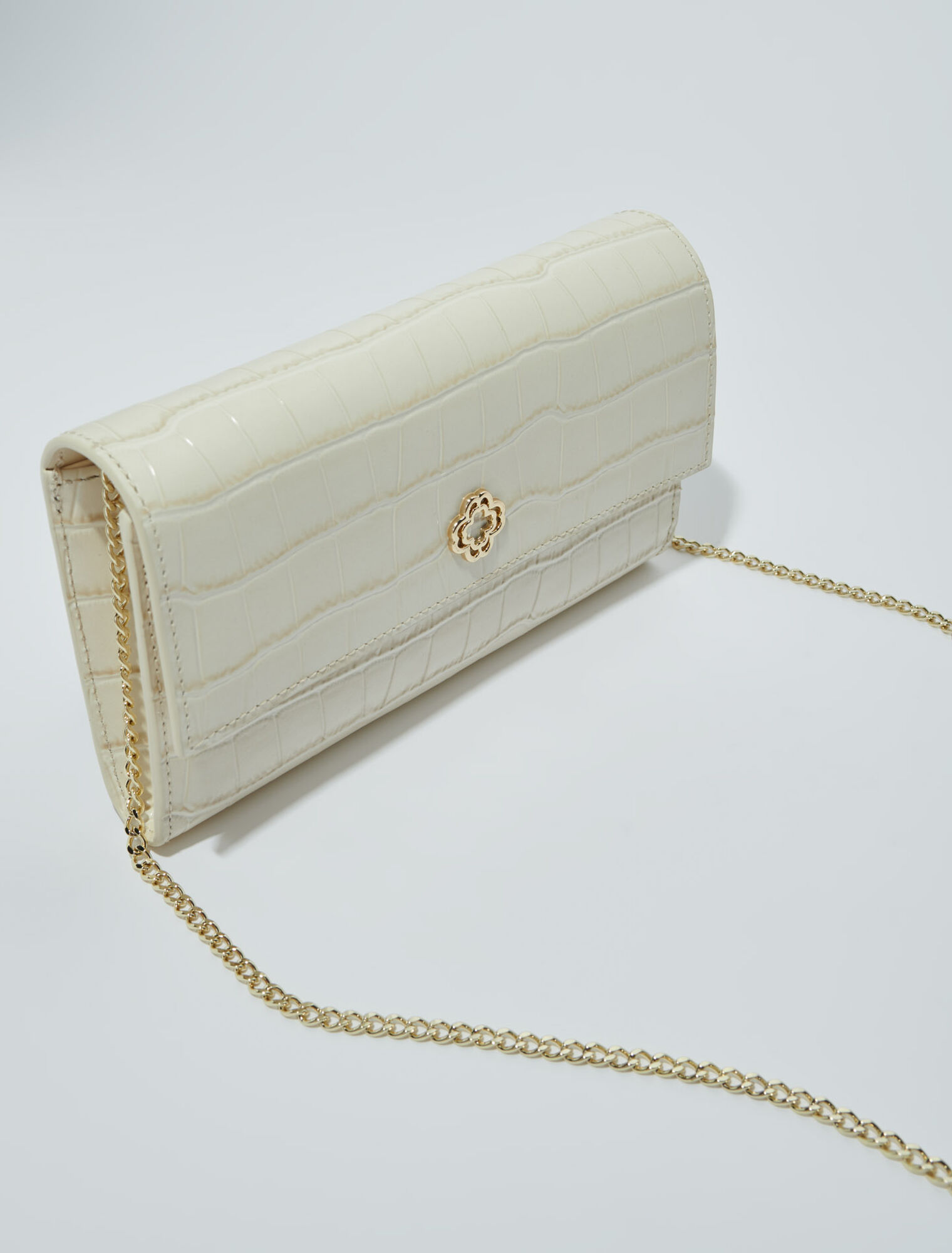 Croc-effect embossed leather bag