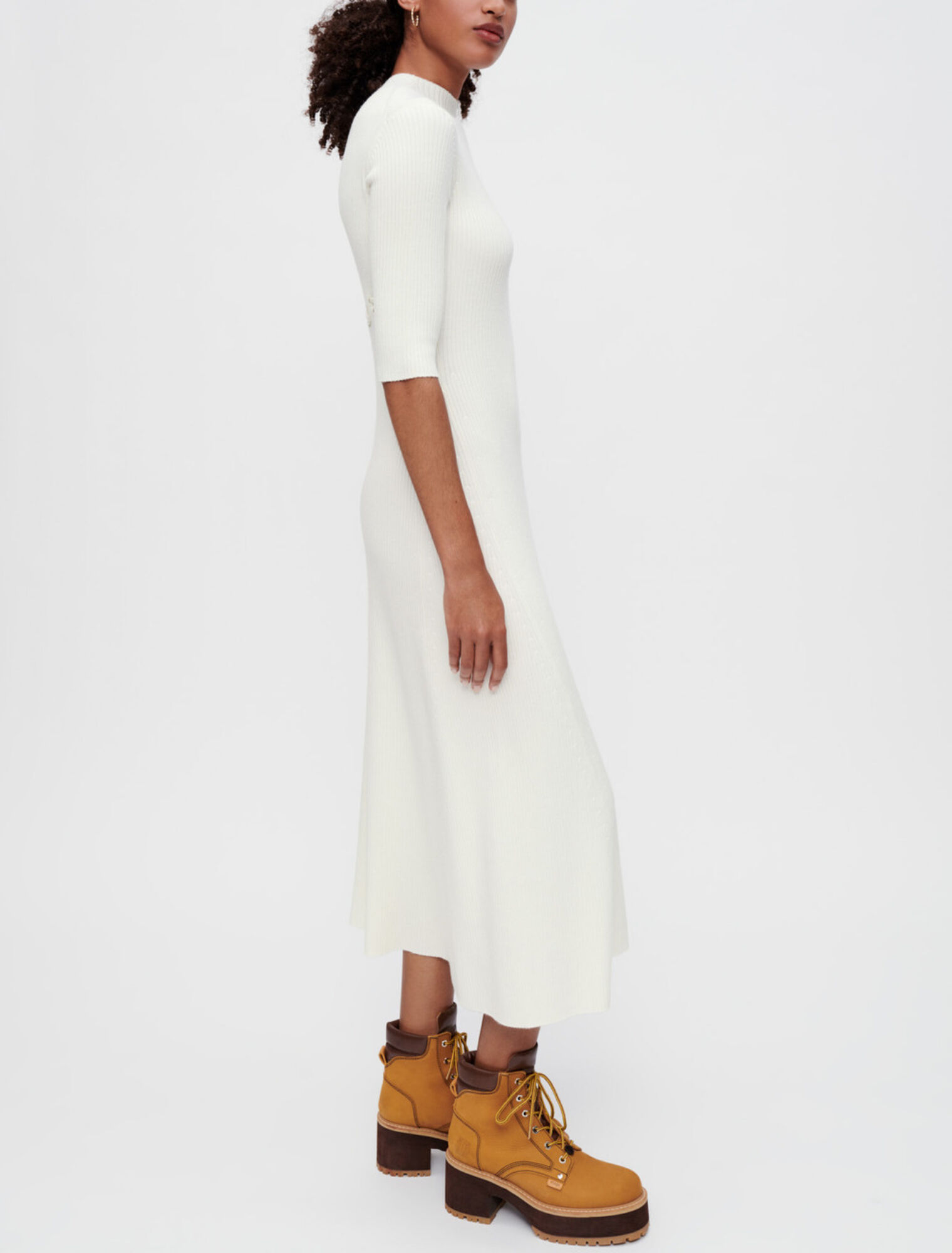 Ribbed knit dress with gold eyelets