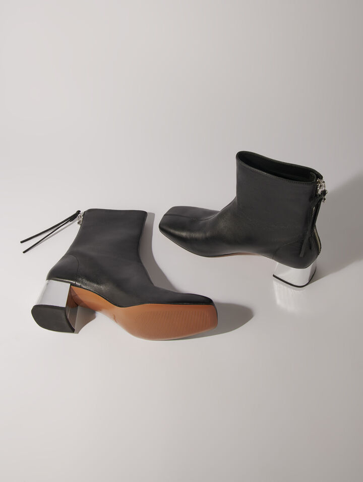 Square-toed leather boots