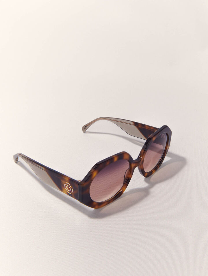 Round acetate glasses