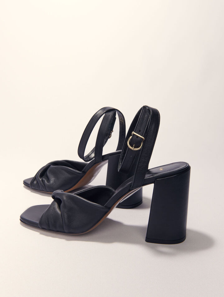 Plain leather sandals with heels