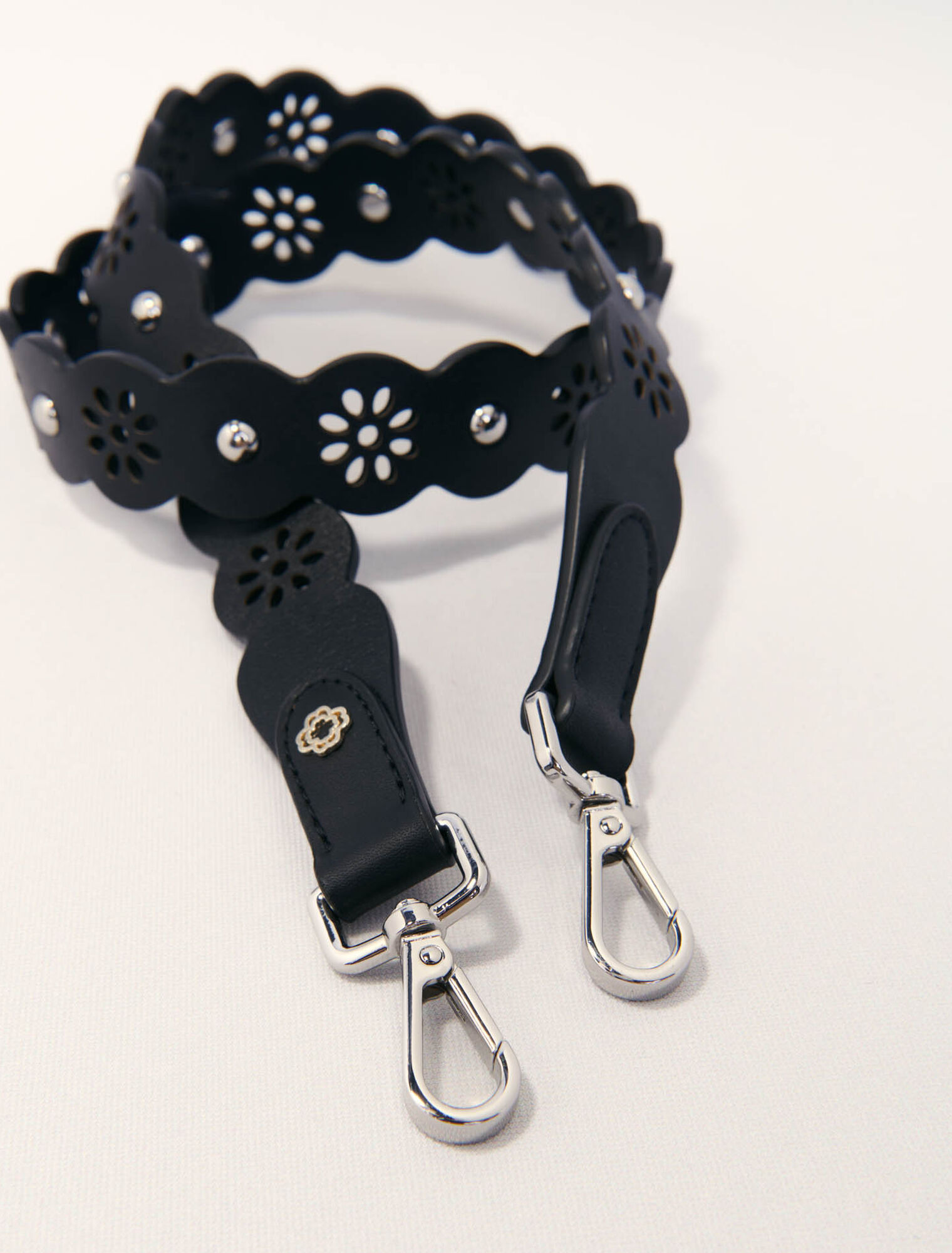 Perforated flower-style strap