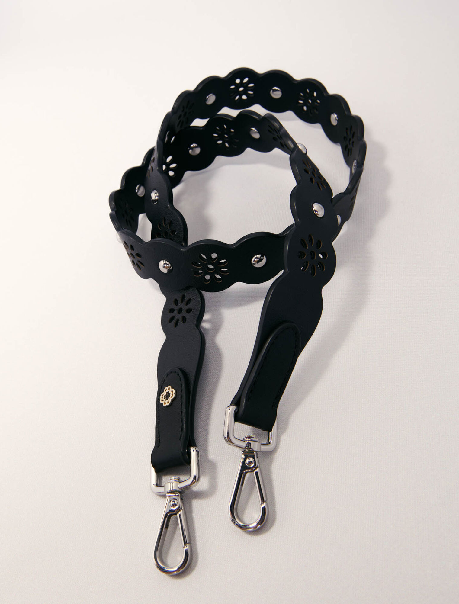 Perforated flower-style strap