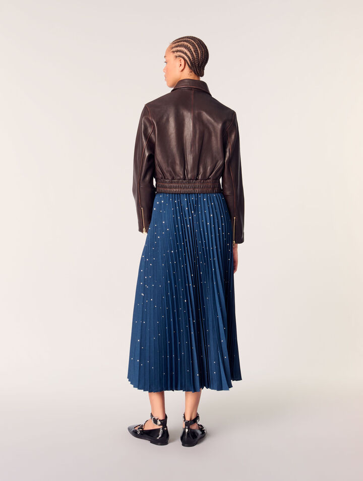 Long pleated skirt with studs