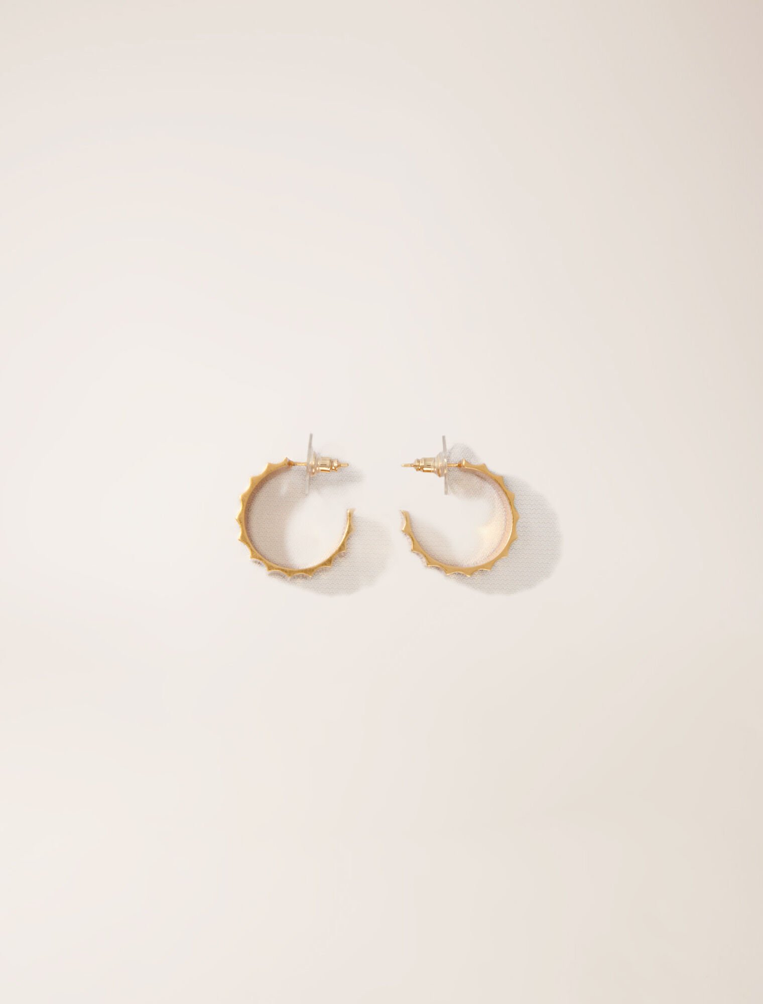 Tapered gold mini hoop earrings