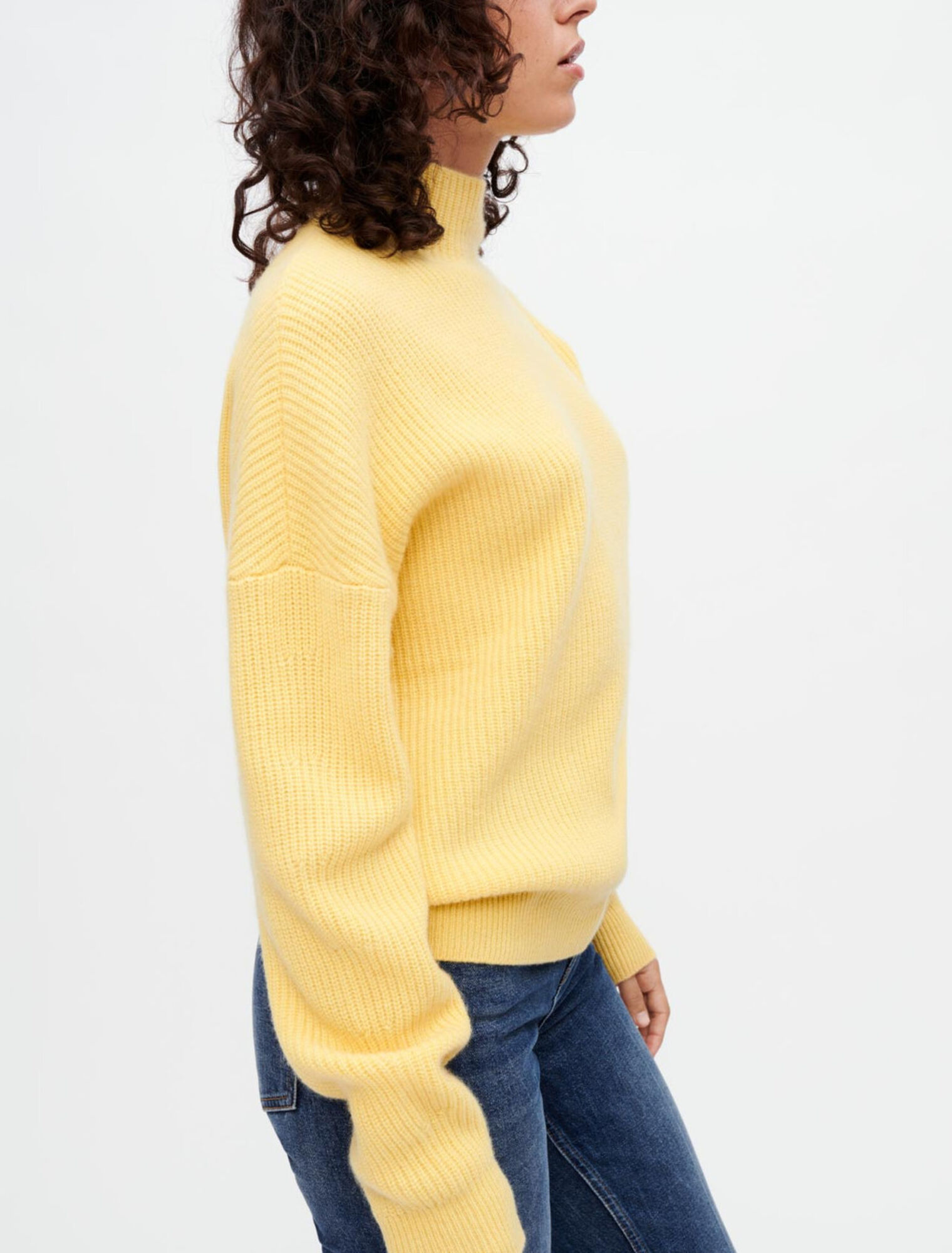 Cashmere sweater with gold press studs