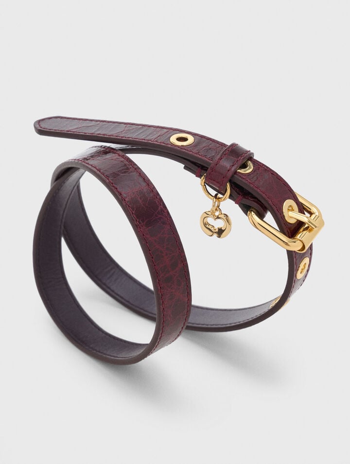 Slim leather belt with eyelets