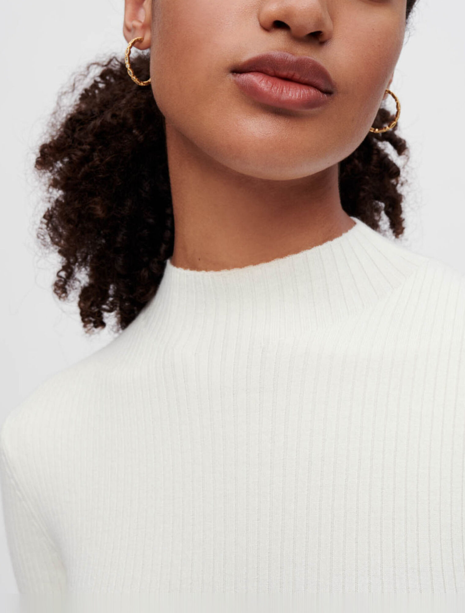 Ribbed knit dress with gold eyelets