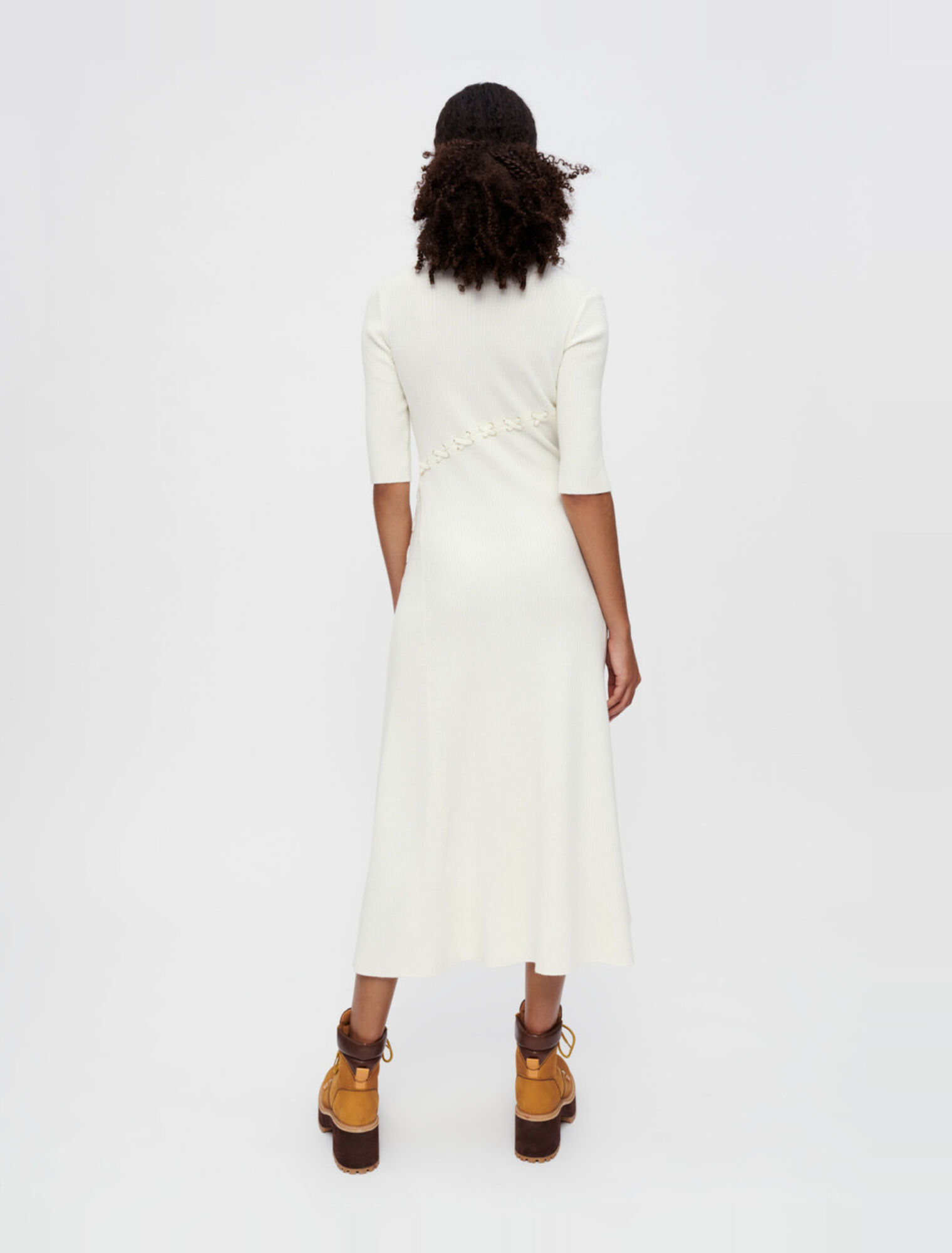 Ribbed knit dress with gold eyelets