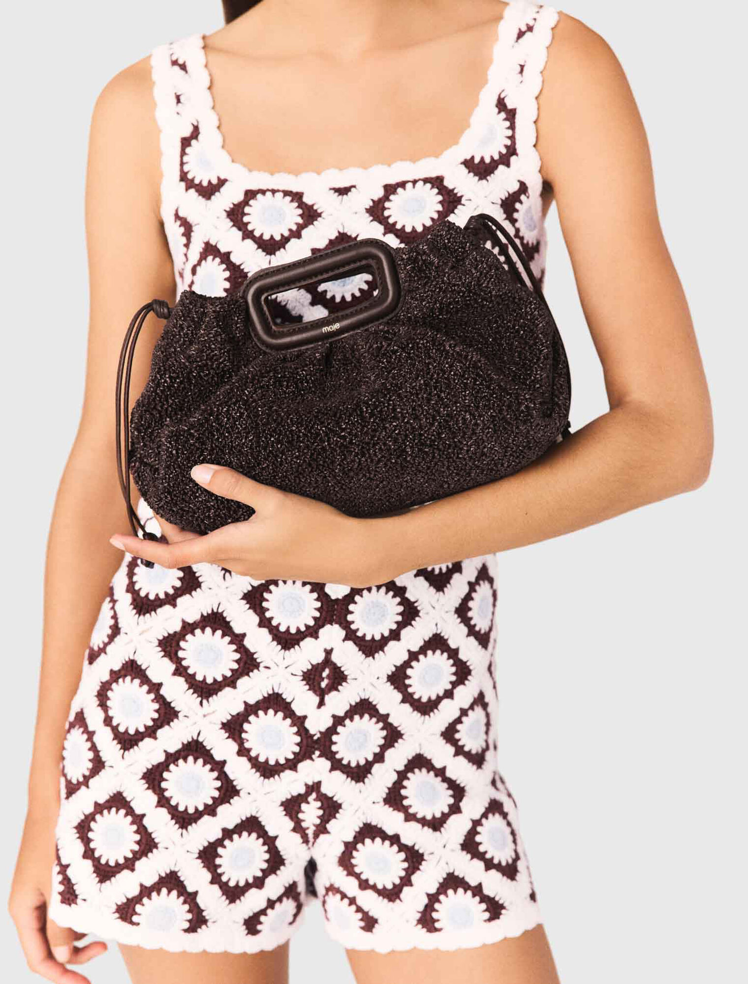 Mipli boucl&eacute; effect clutch bag