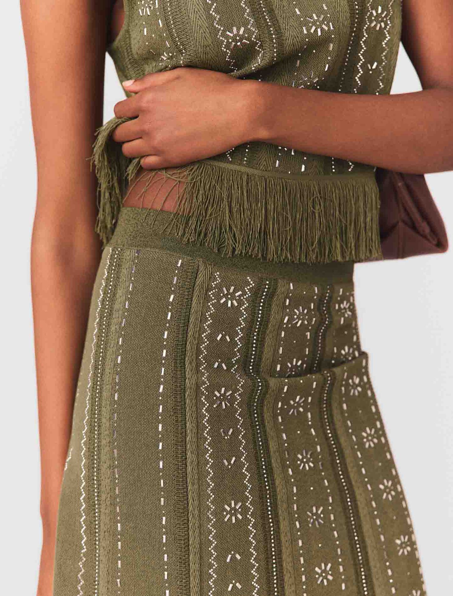 Knit skirt with rhinestone flowers