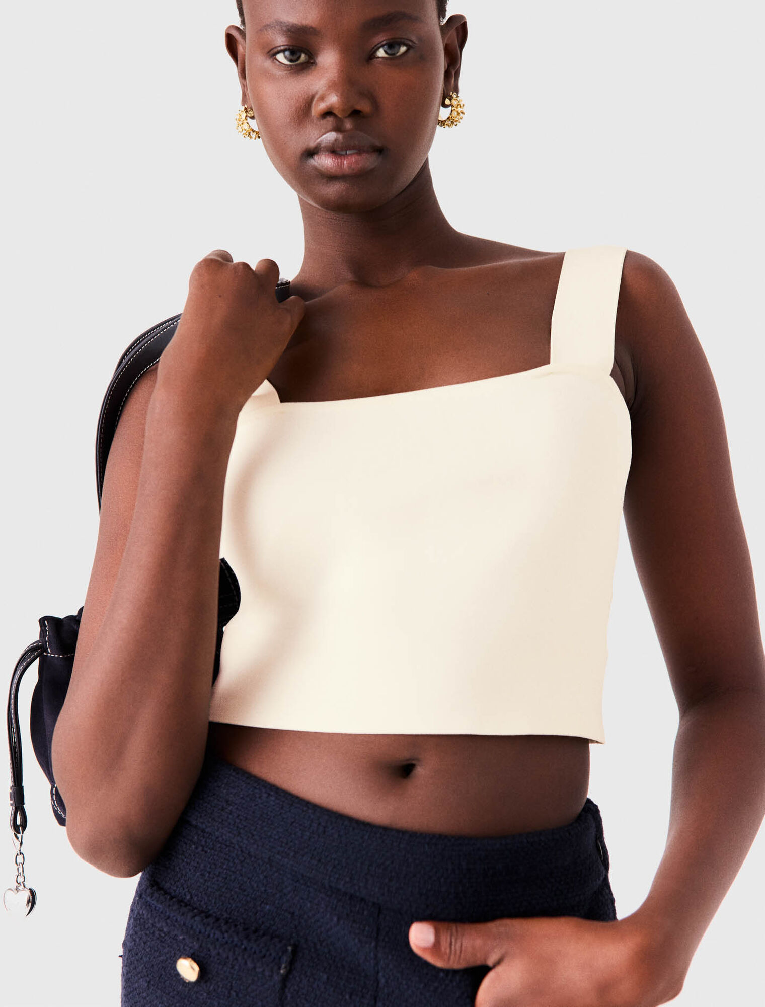 Knitted crop top with straps