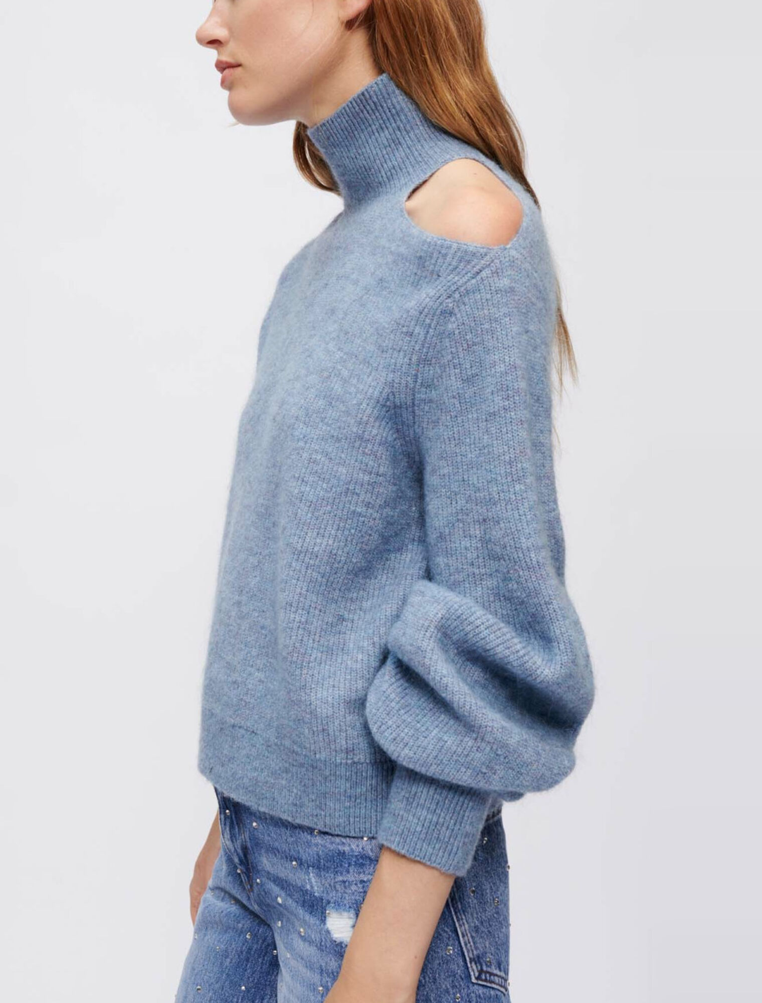 High-neck sweater with open shoulder