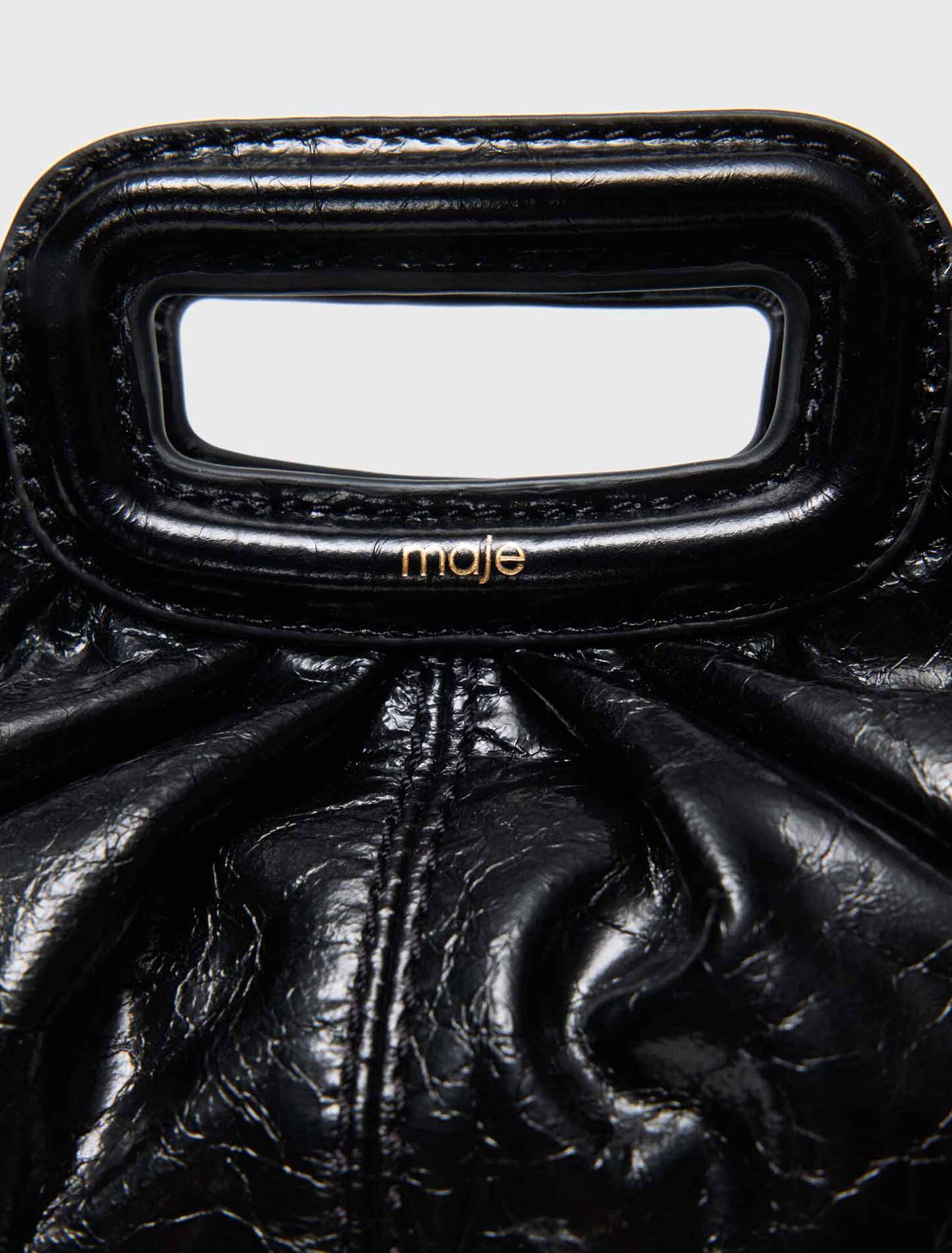 Mini crackled leather clutch