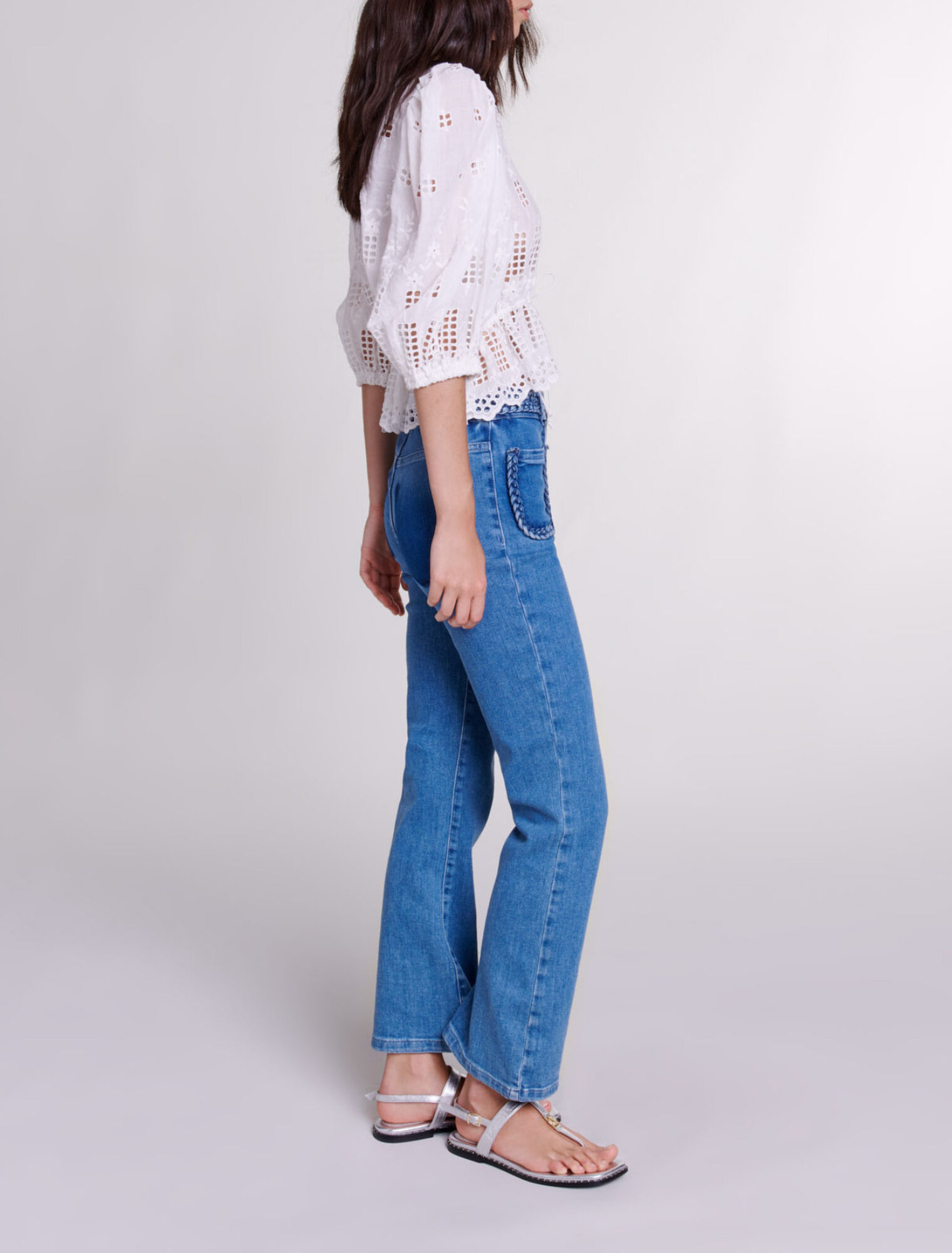 Jeans con detalles trenzados