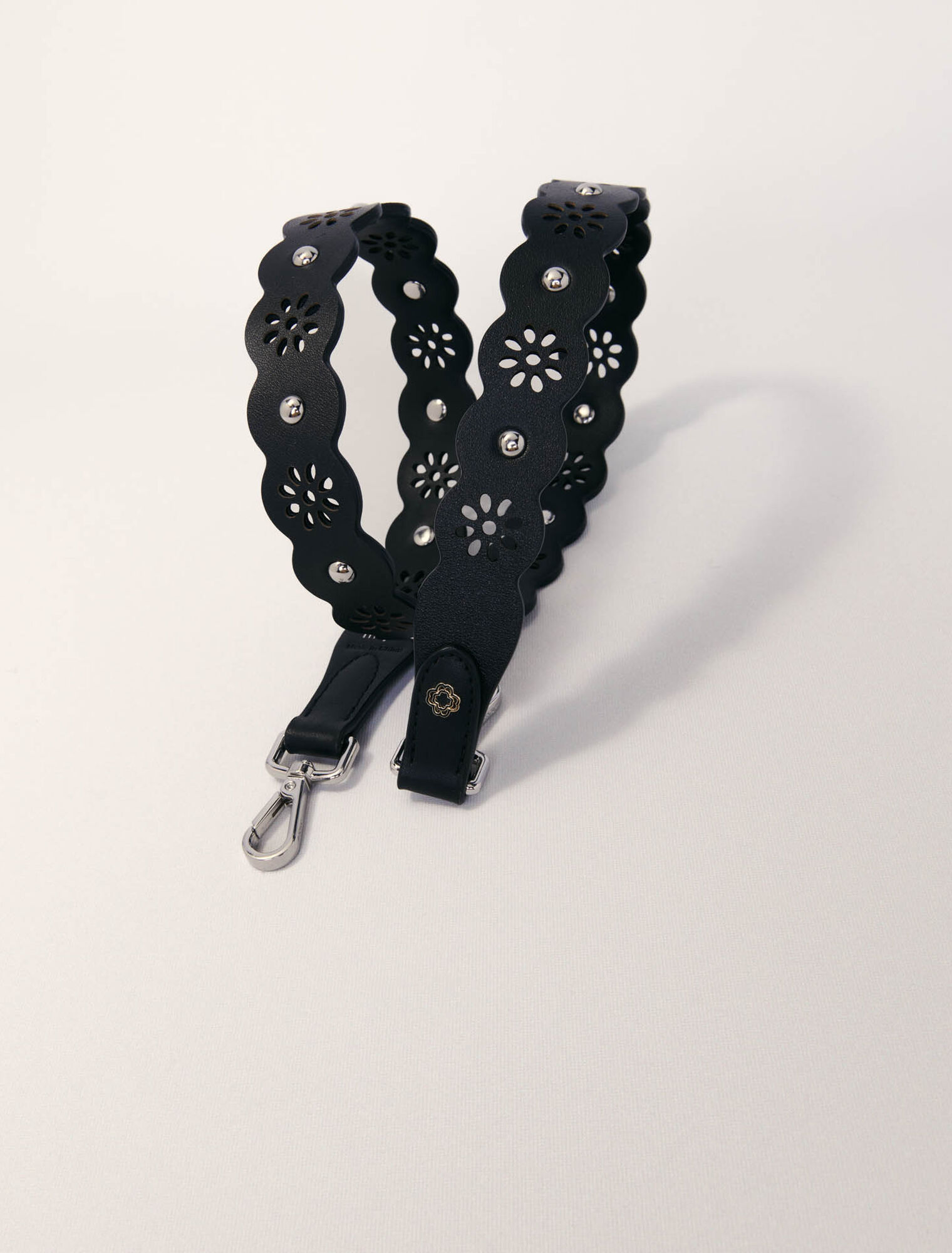Perforated flower-style strap