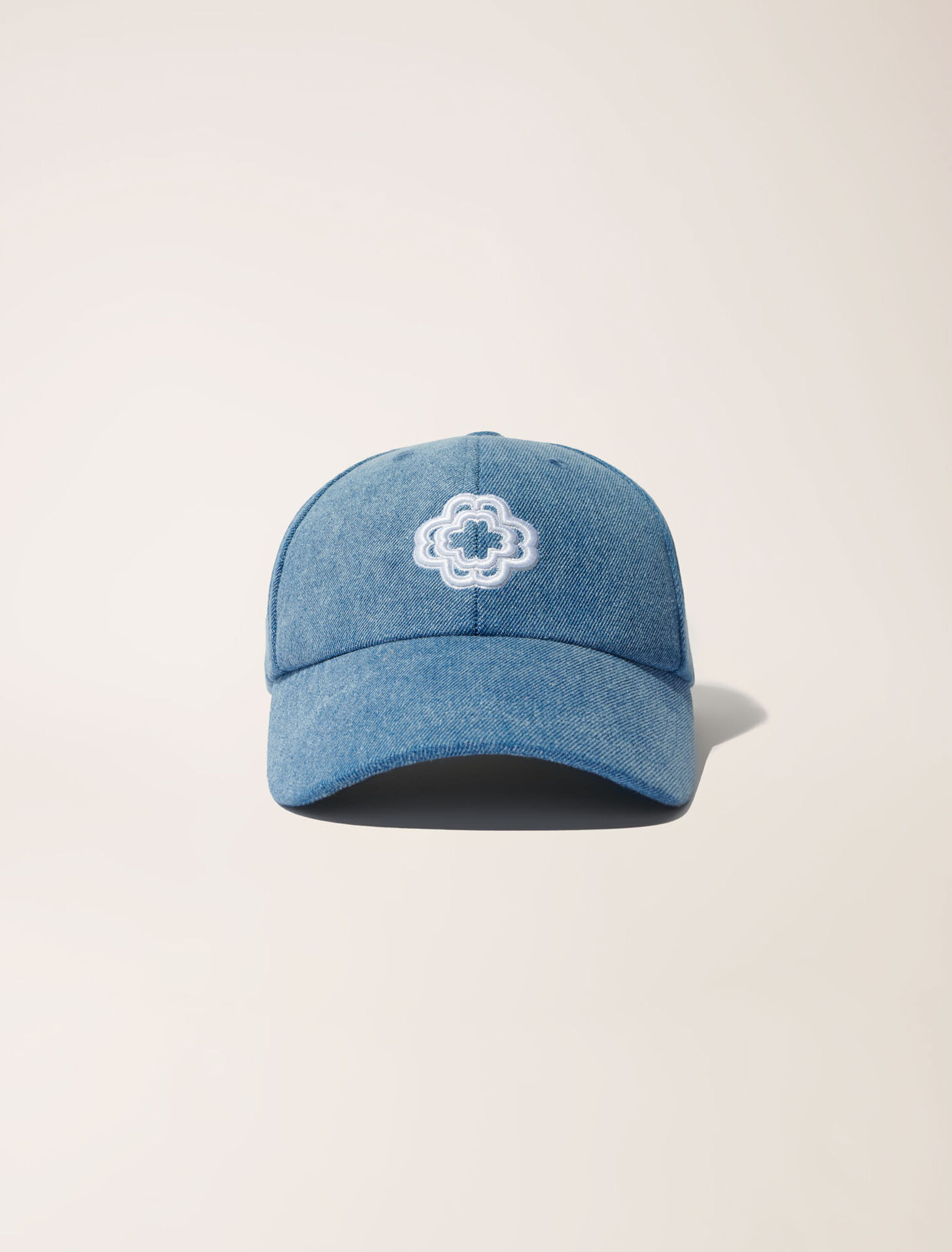 Denim cap with clover logo