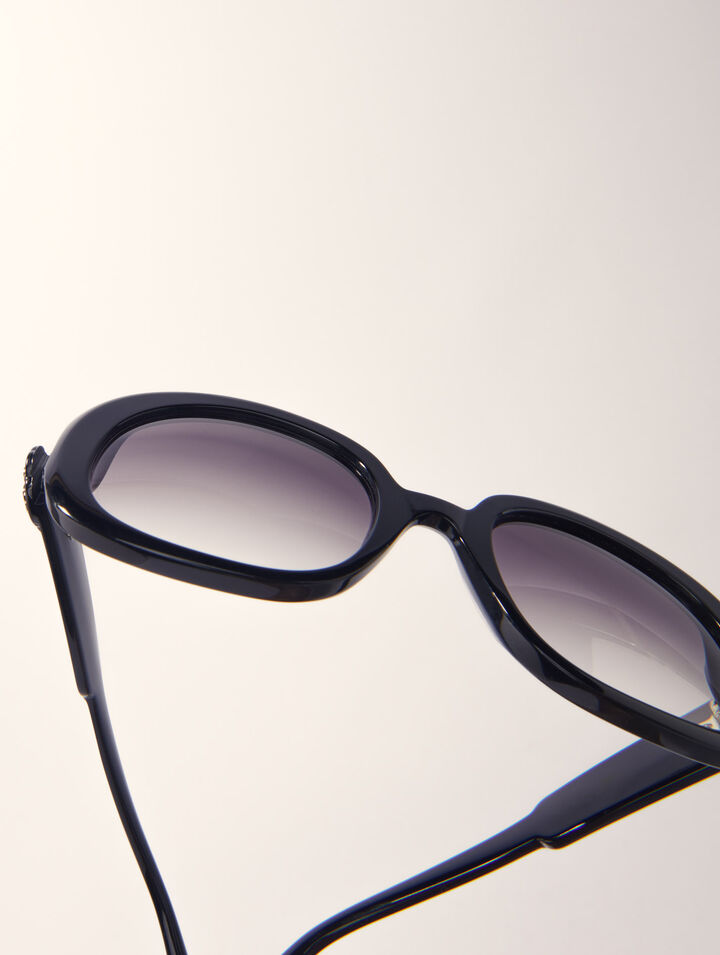 Round acetate glasses