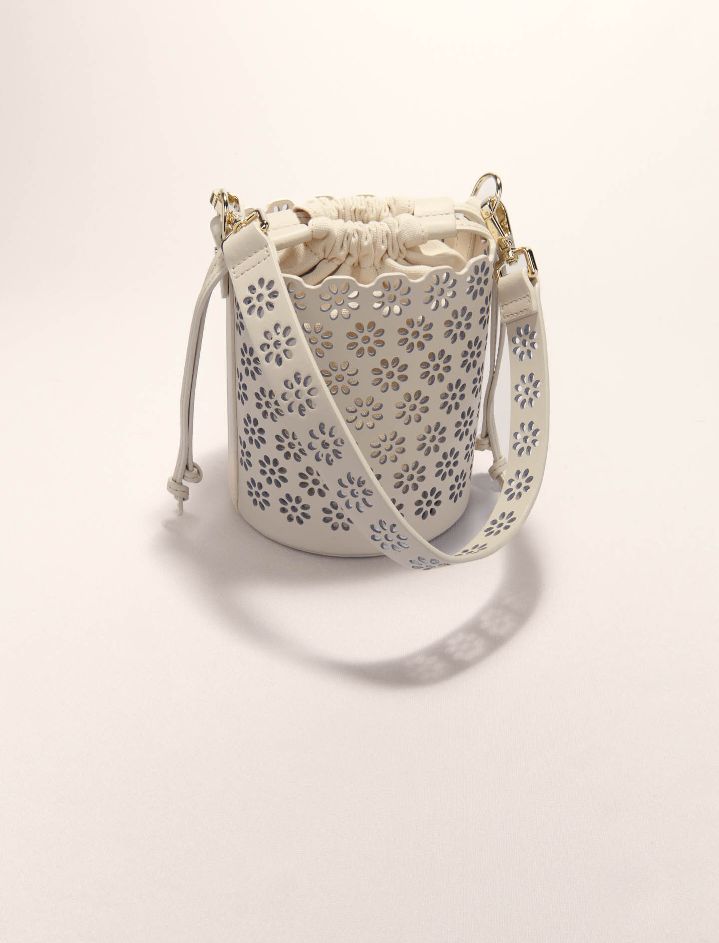 Perforated leather bucket bag White for Women | Maje