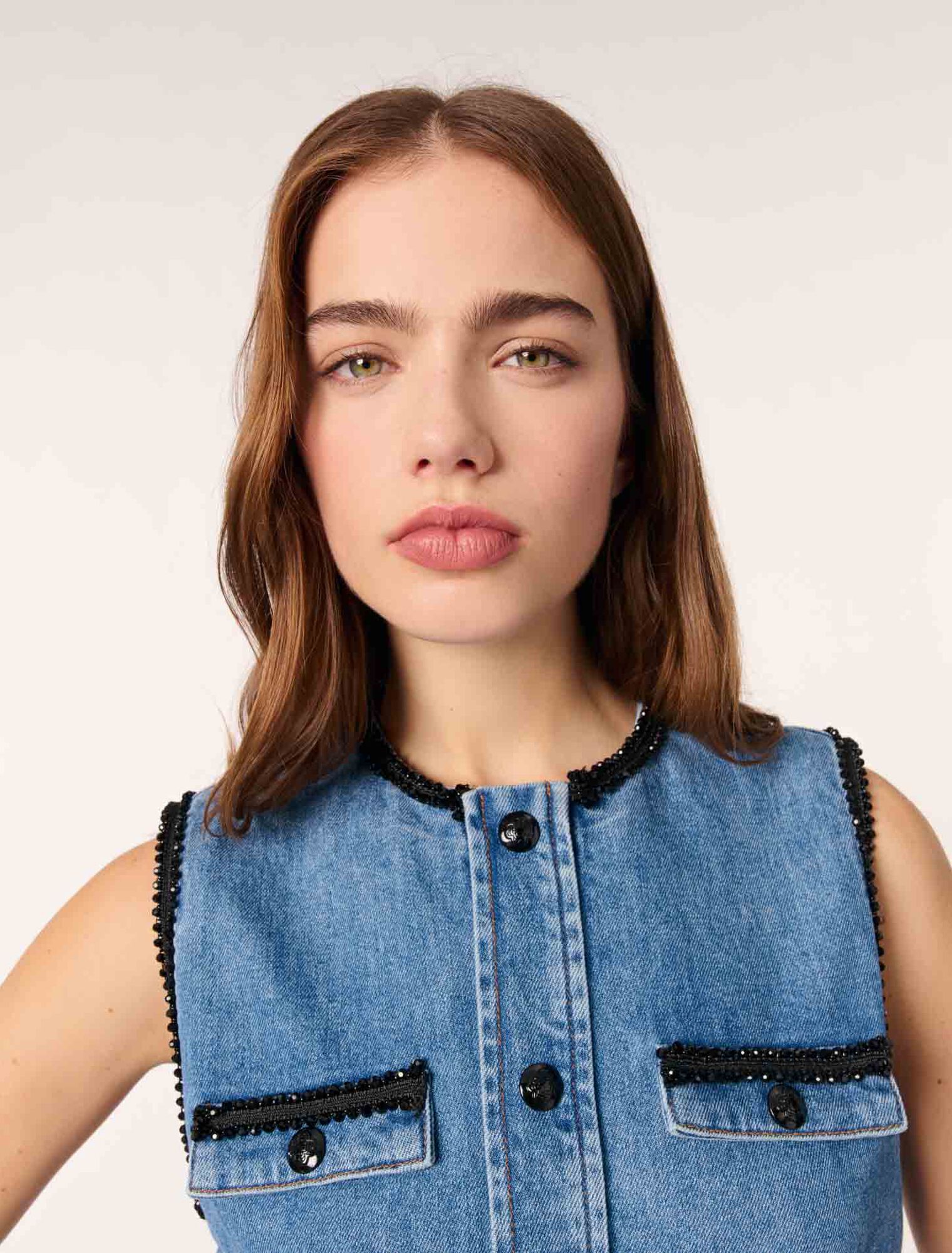 Denim dress with embroidered trim
