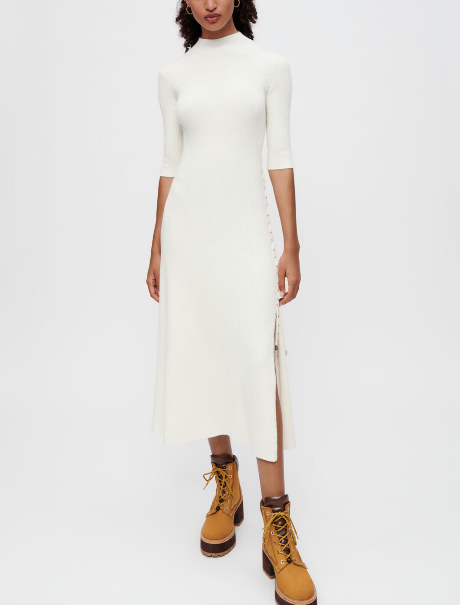 Ribbed knit dress with gold eyelets