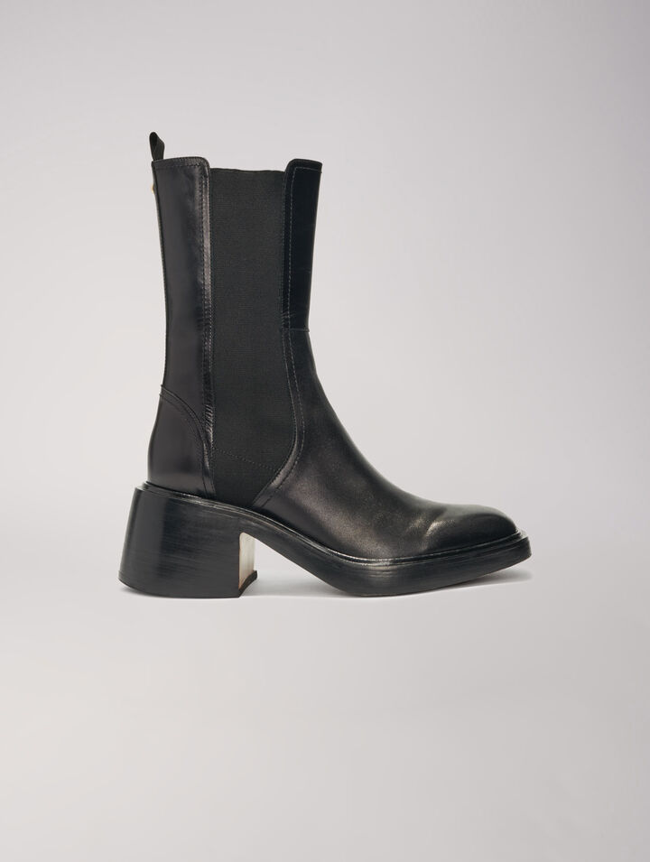 Black leather ankle boots and square toe