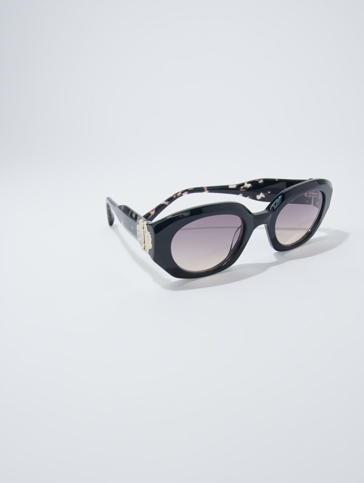 Round acetate glasses