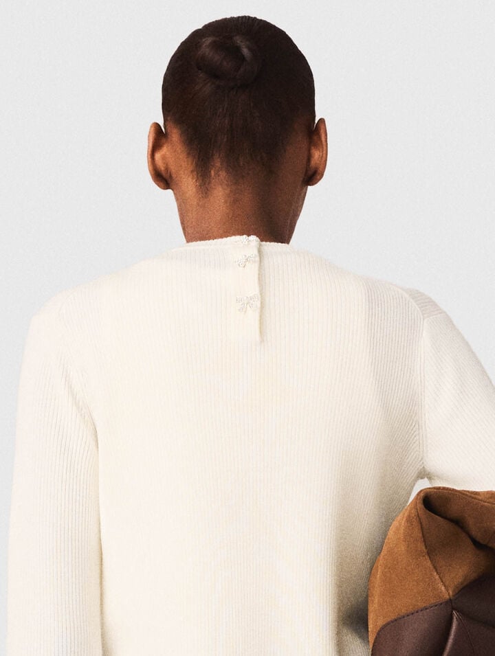 Jumper with jewelled buttons