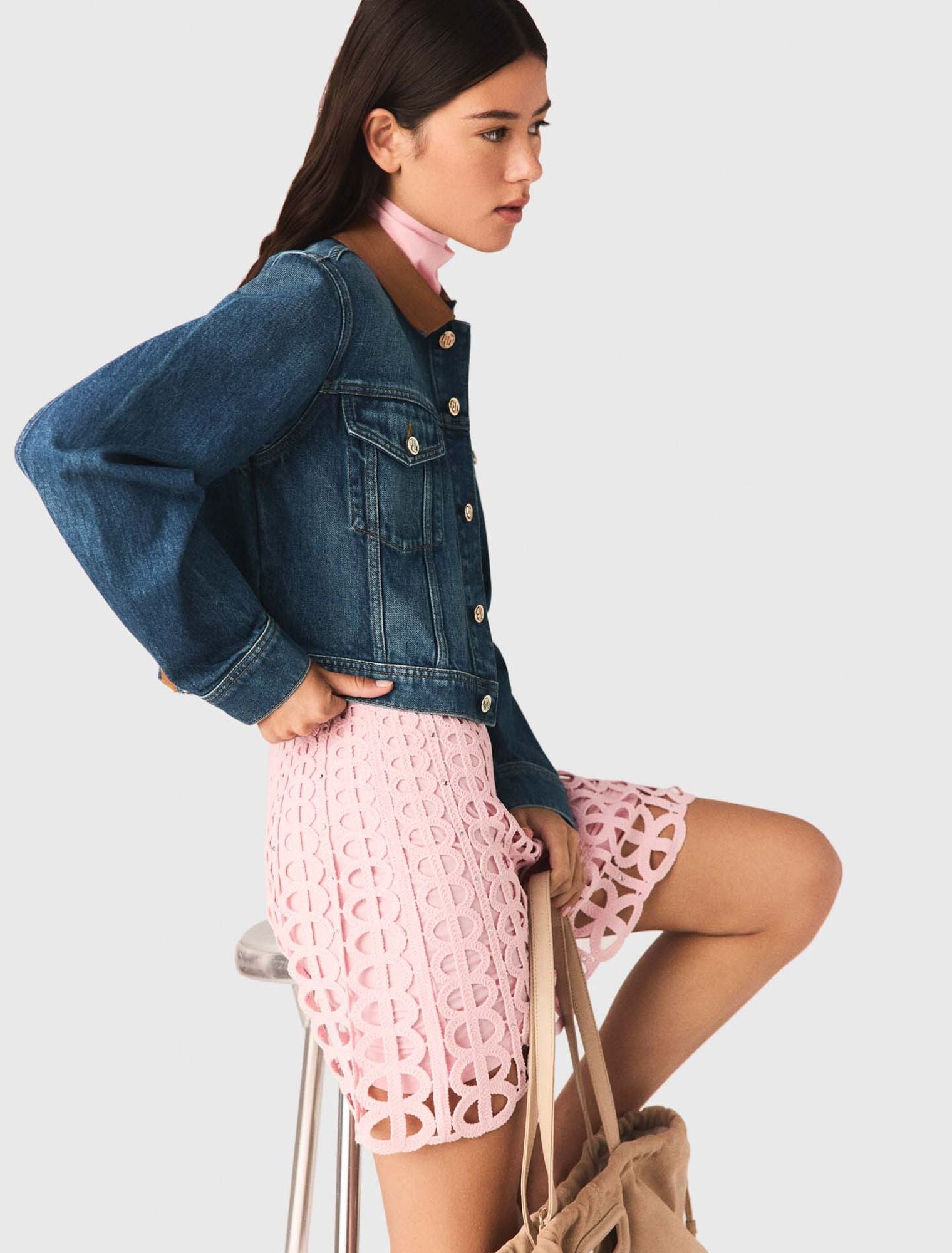 Denim jacket with leather collar