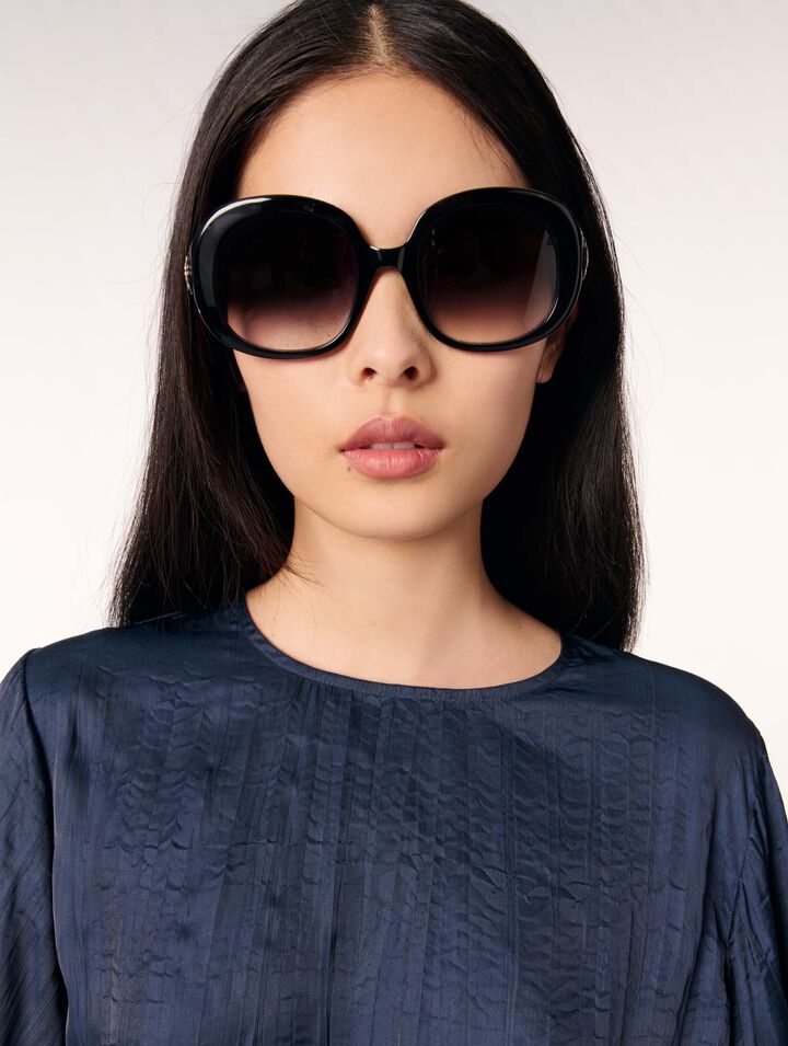 Round acetate glasses