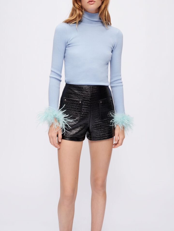 Turtleneck pullover with feathered cuffs
