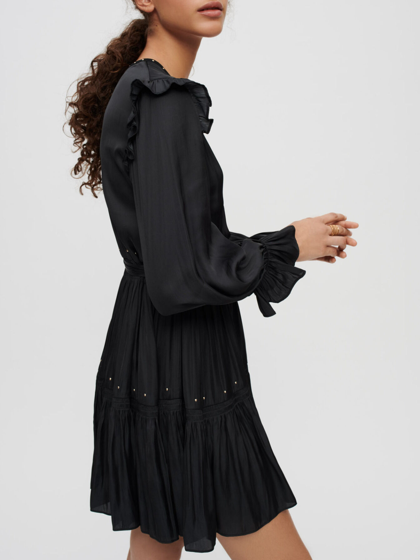 Black flowing satin dress, gold studs