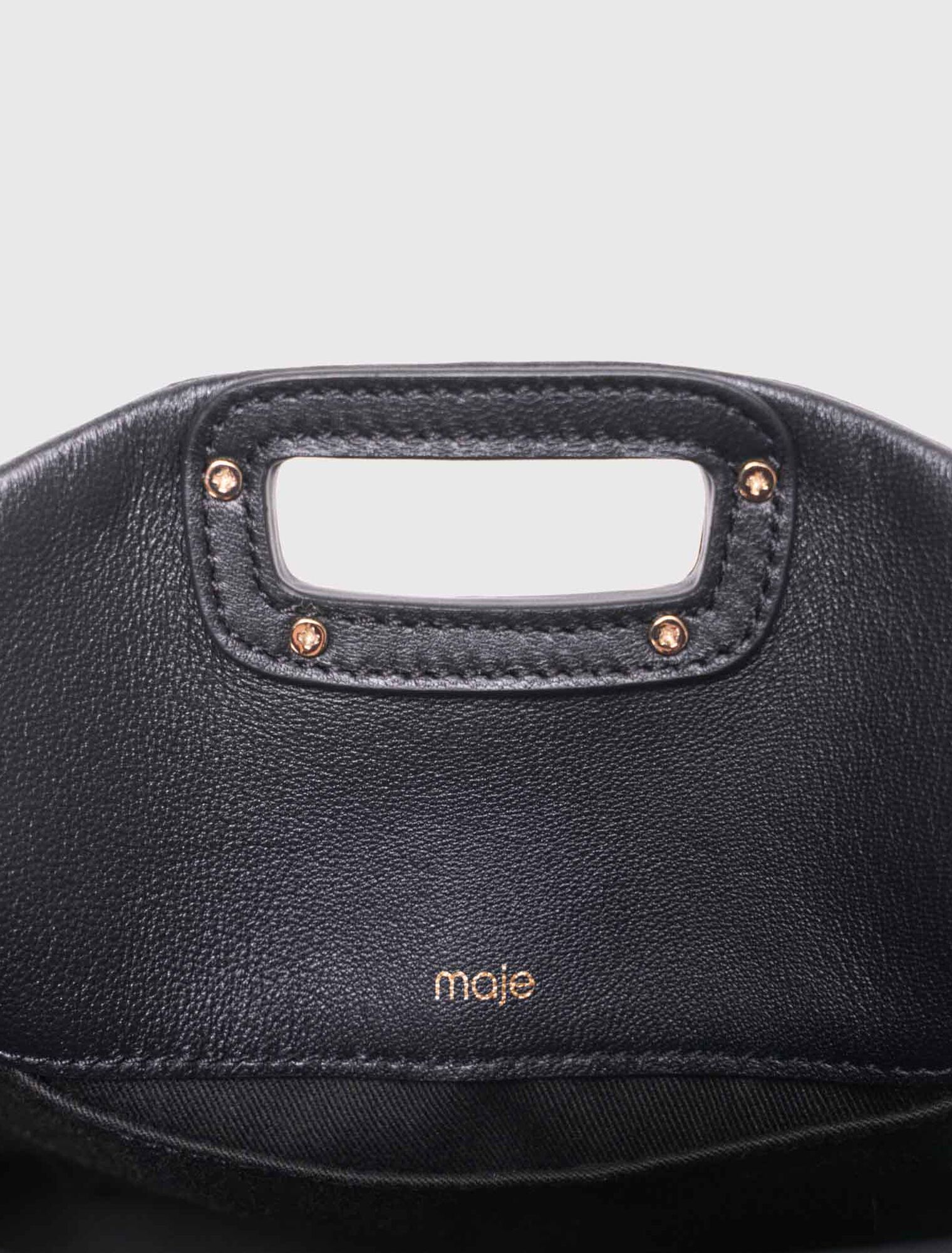 Gold handle Miss M Mini bag