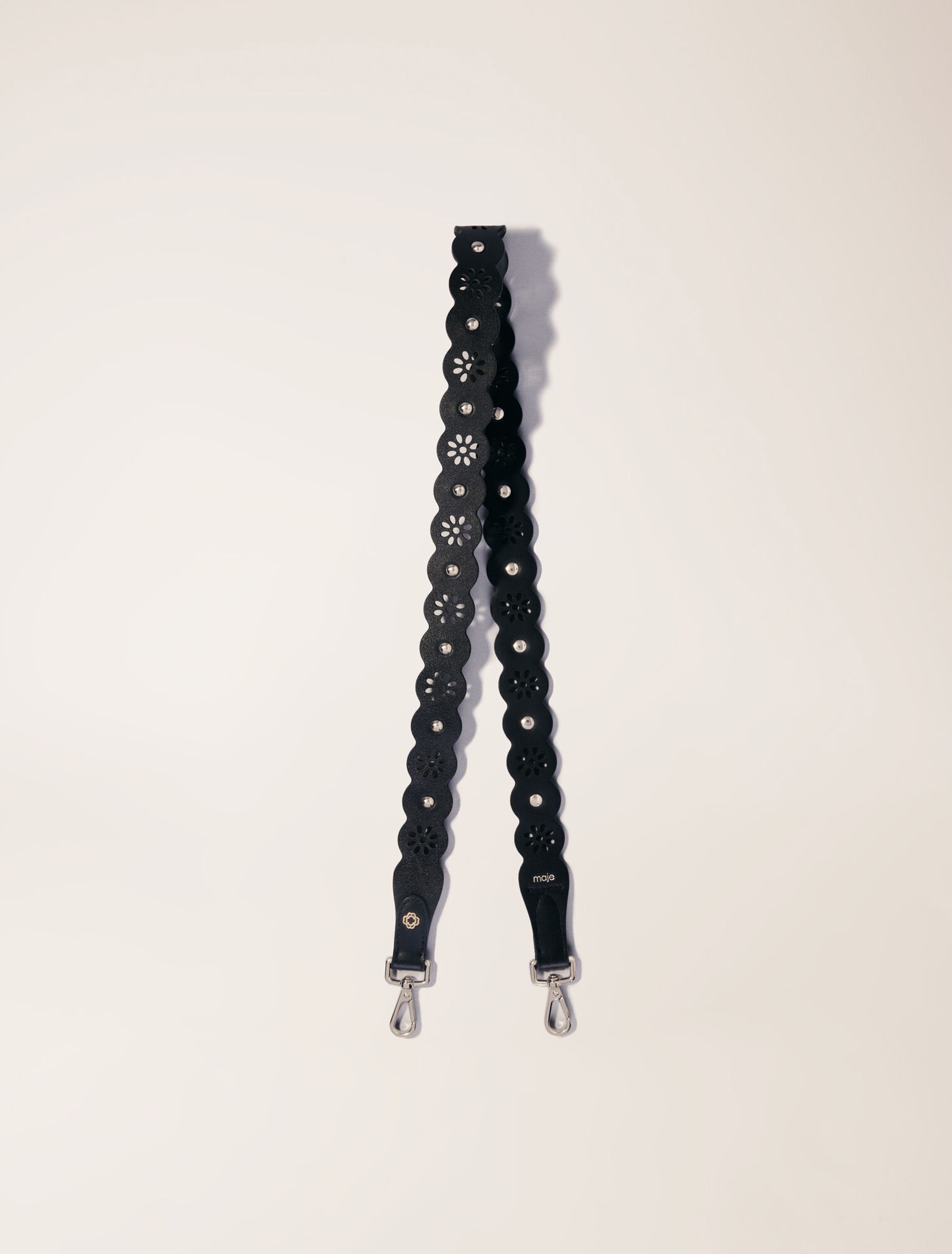 Perforated flower-style strap