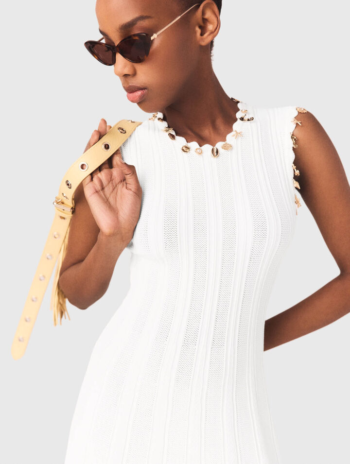 Knit dress with gold jewellery