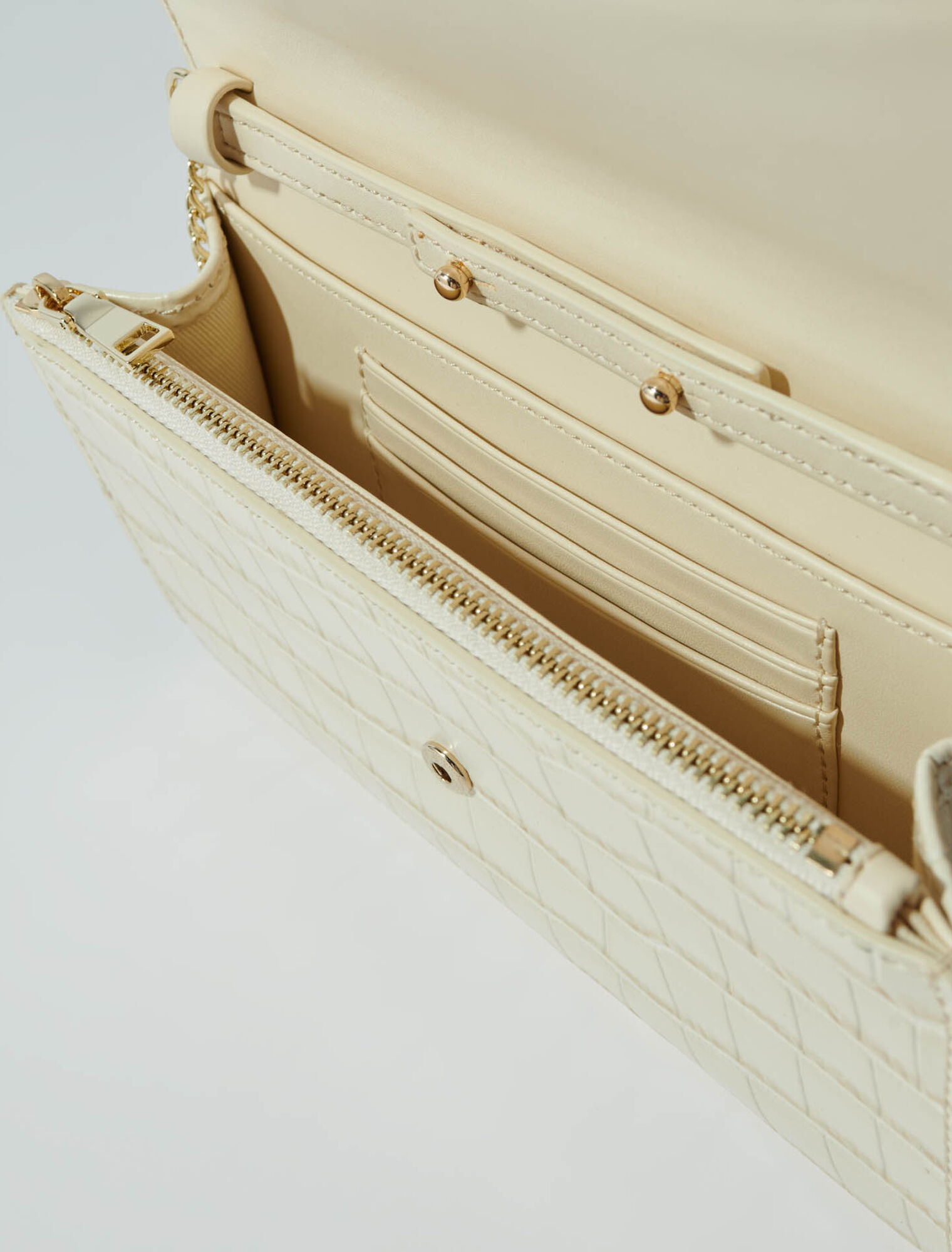 Croc-effect embossed leather bag