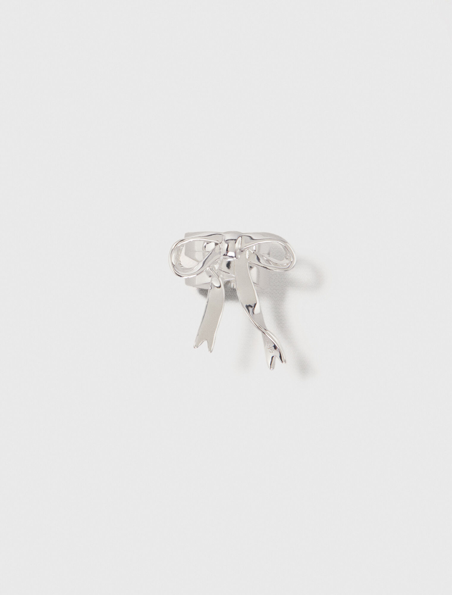 Open silver bow ring