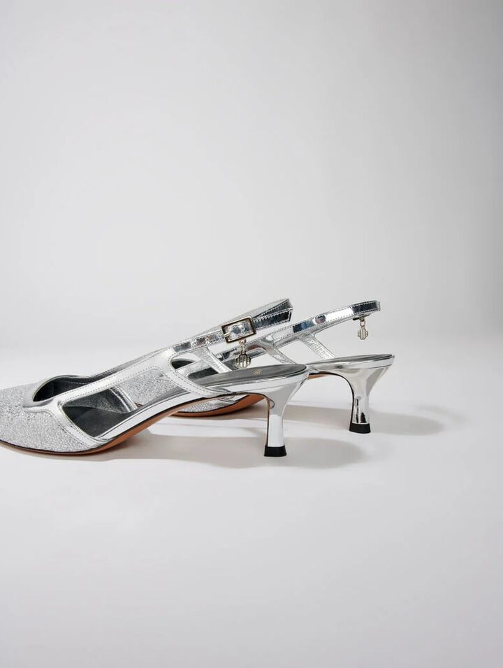 Pointed silver pumps