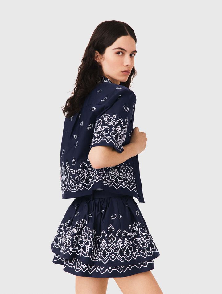 Short embroidered ruffled skirt