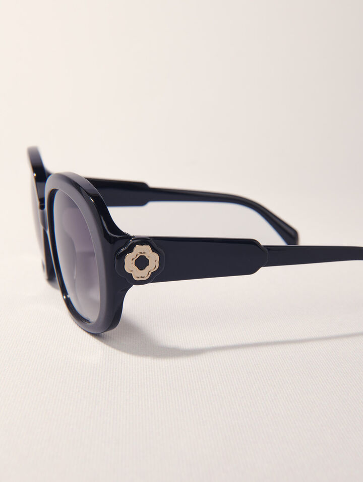 Round acetate glasses