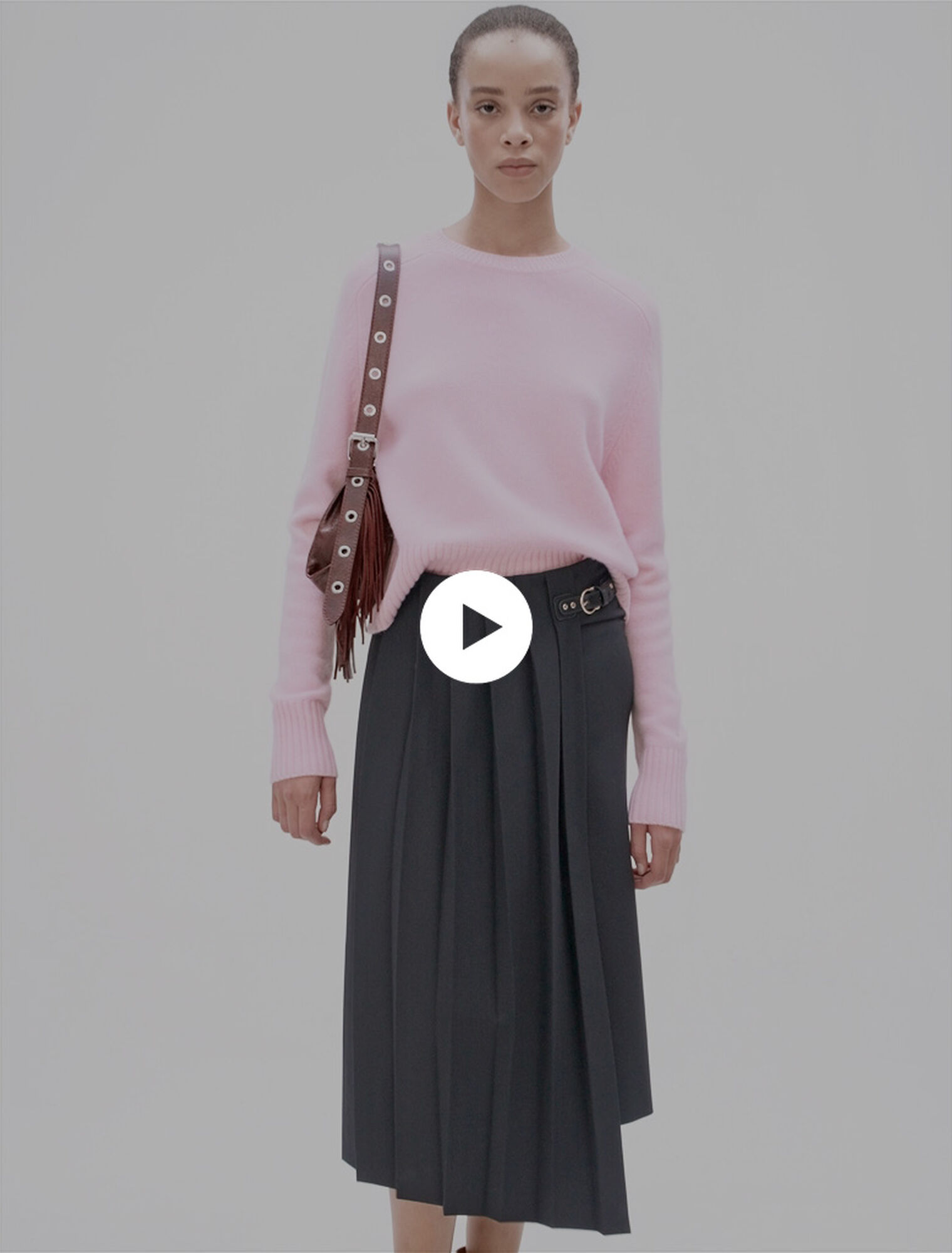 Asymmetrical long pleated skirt
