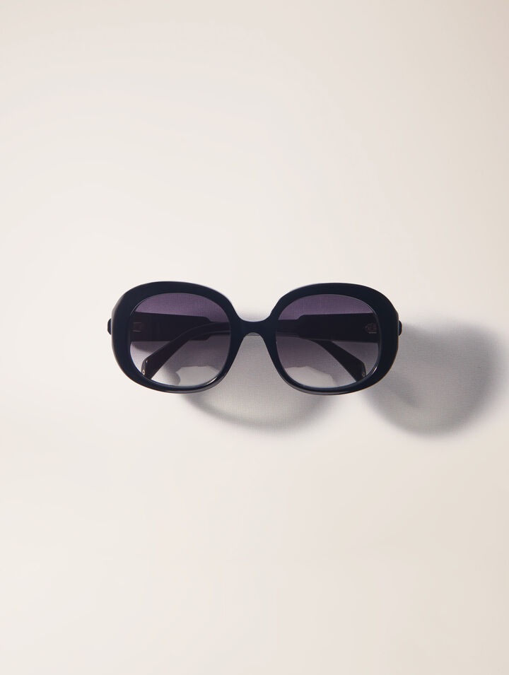 Round acetate glasses