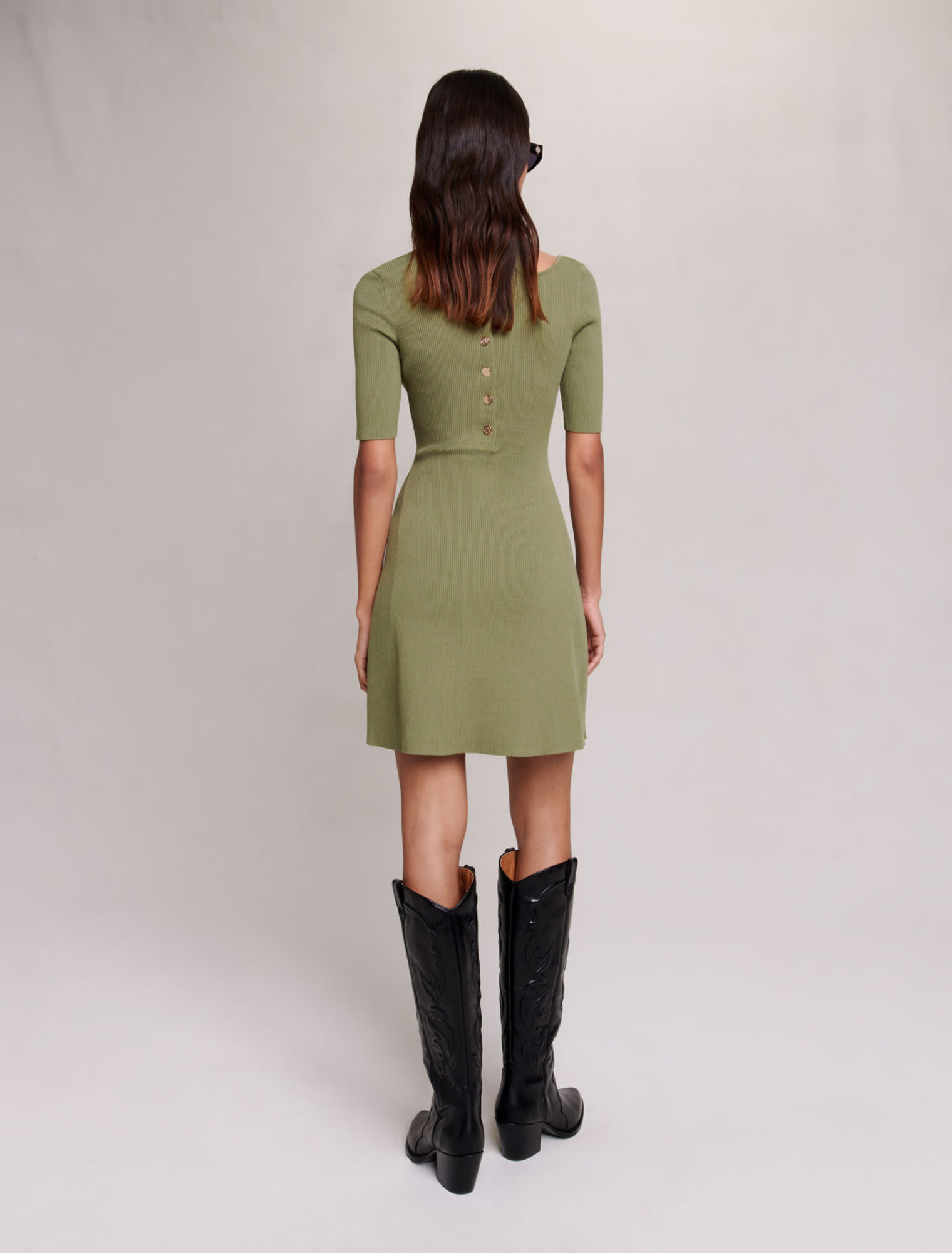 Knit dress with cut-out at the shoulder