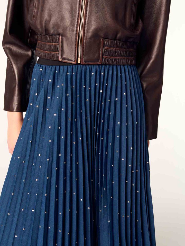 Long pleated skirt with studs