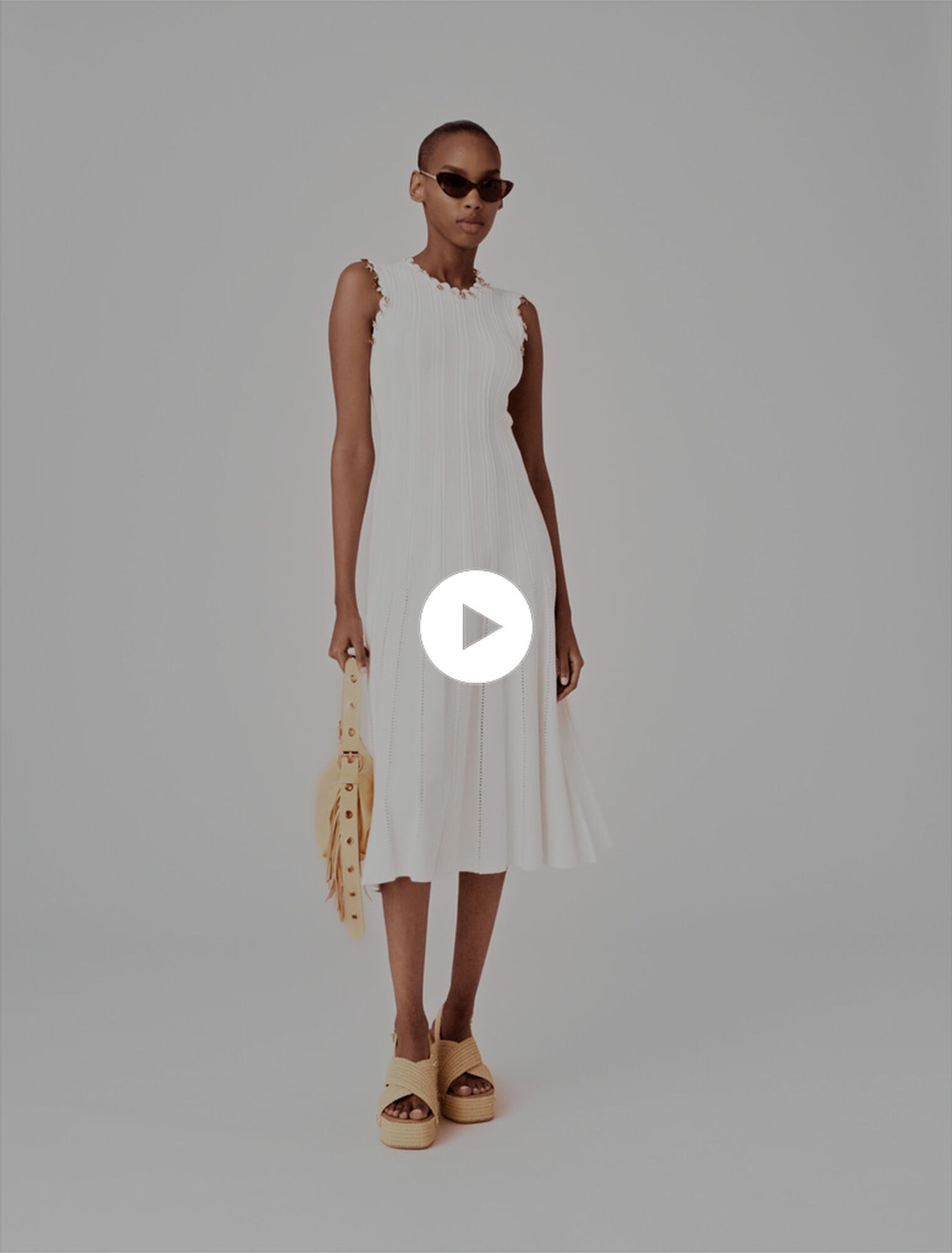 Knit dress with gold jewellery