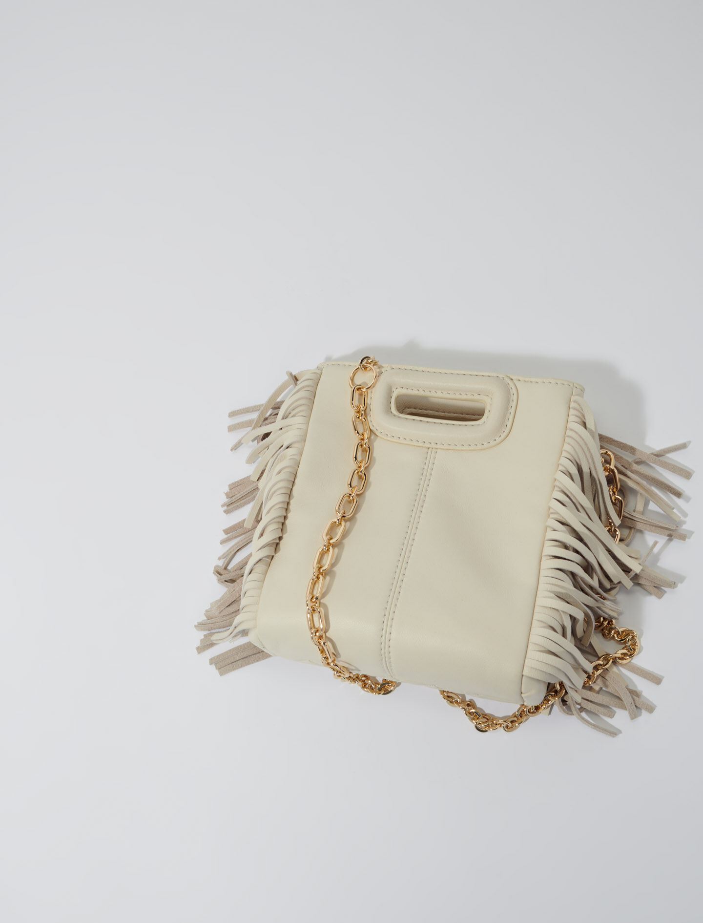 Studded M quilted leather mini bag