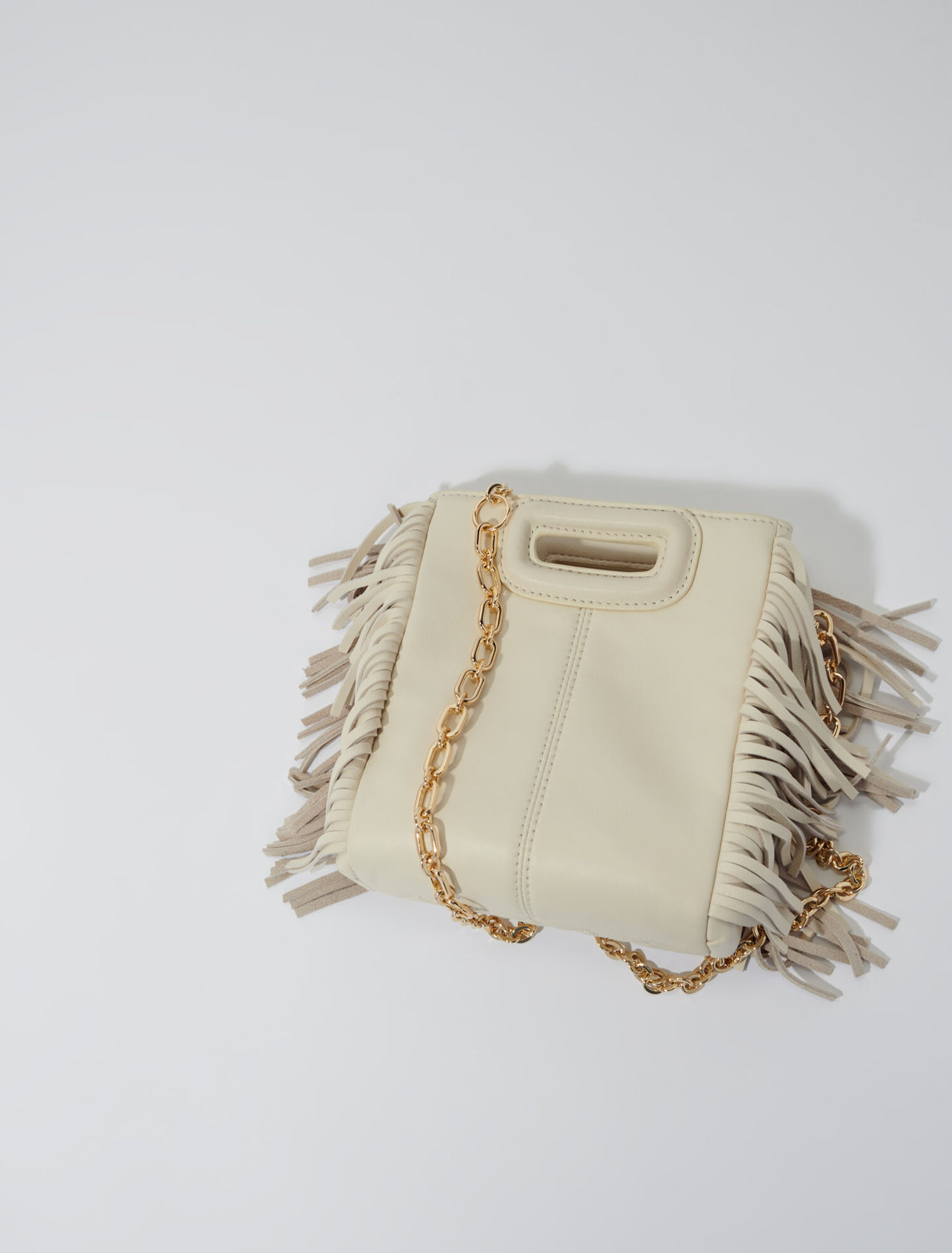 Studded M quilted leather mini bag
